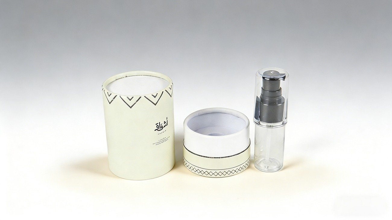 Arabic-style cylindrical perfume gift box with matte finish and gold accents by Crown Win Package