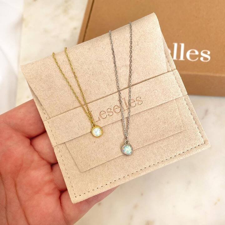 Brand paper shipping box for jewelry transportation, containing shredded paper filling | Crown Win Packaging Box Manufacturer