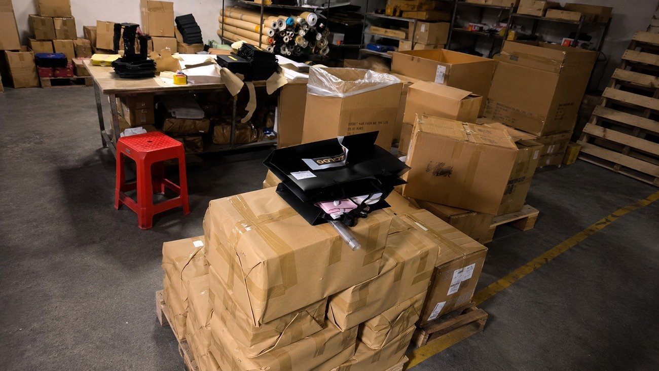 Crown Win Box Manufacturer factory warehouse, finished matte black packaging goods prepared for export shipment, strict packaging quality control